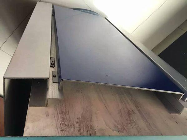 How should the composite aluminum panel be installed?